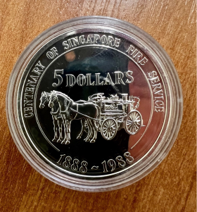 Сингапур. Серебряная монета 5 долларов.